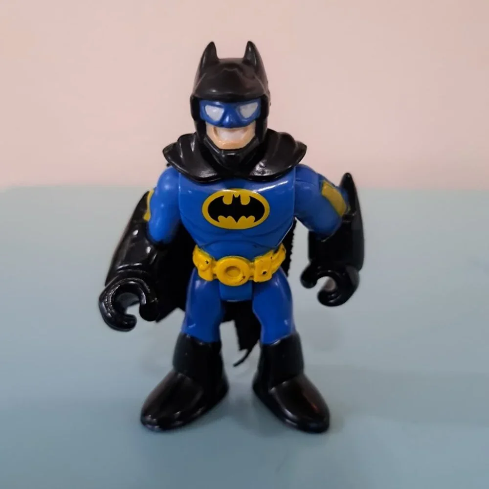 Fisher-Price Imaginext DC Super Friends Batman action figure in blue suit